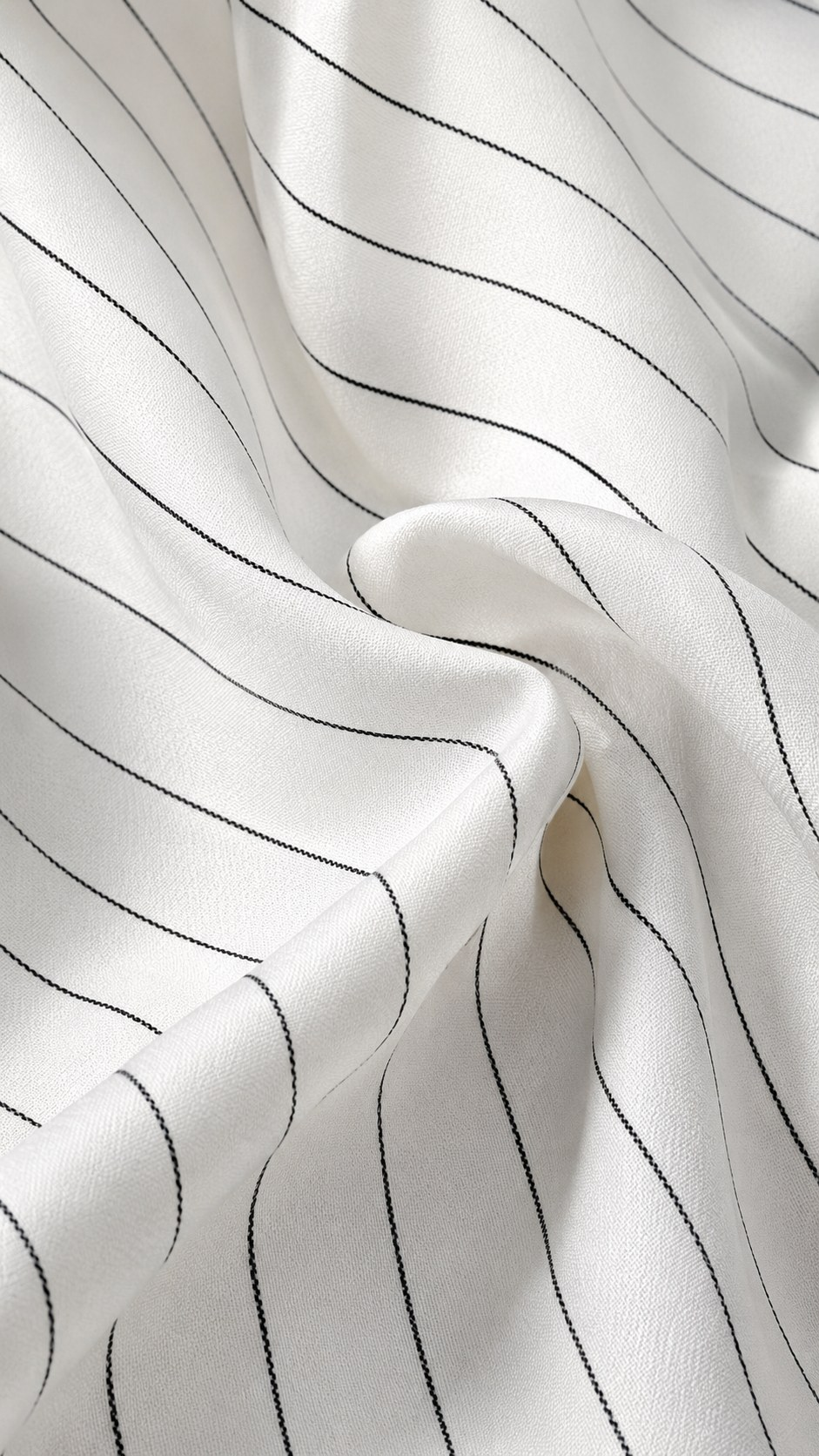 White pinstripe suiting fabric close-up showing fine grey stripe | Beyond Formals