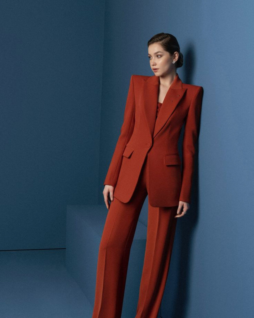 Women's red blazer suit set with a modern tailored fit.