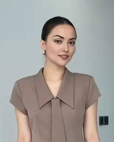 Brown coord set with a single-breasted blazer and flared pants with tie.