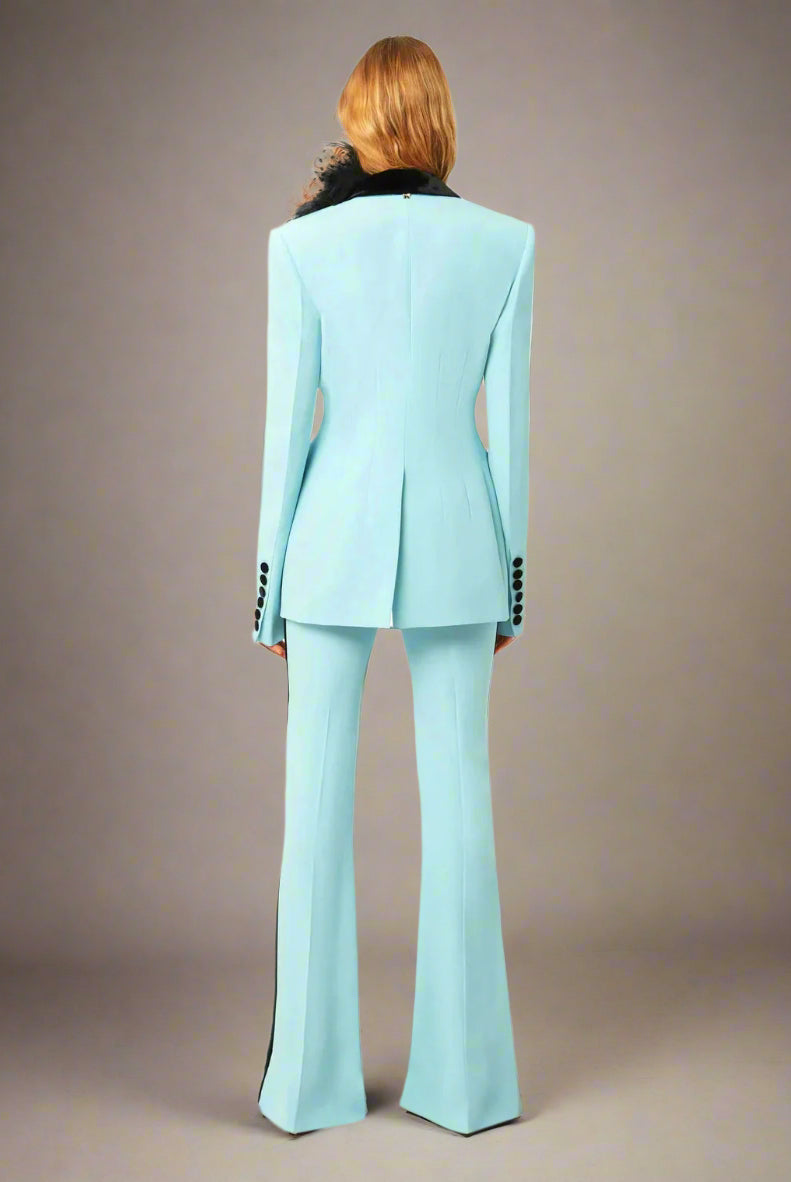 Powder blue double-breasted blazer suit set with flared trousers.