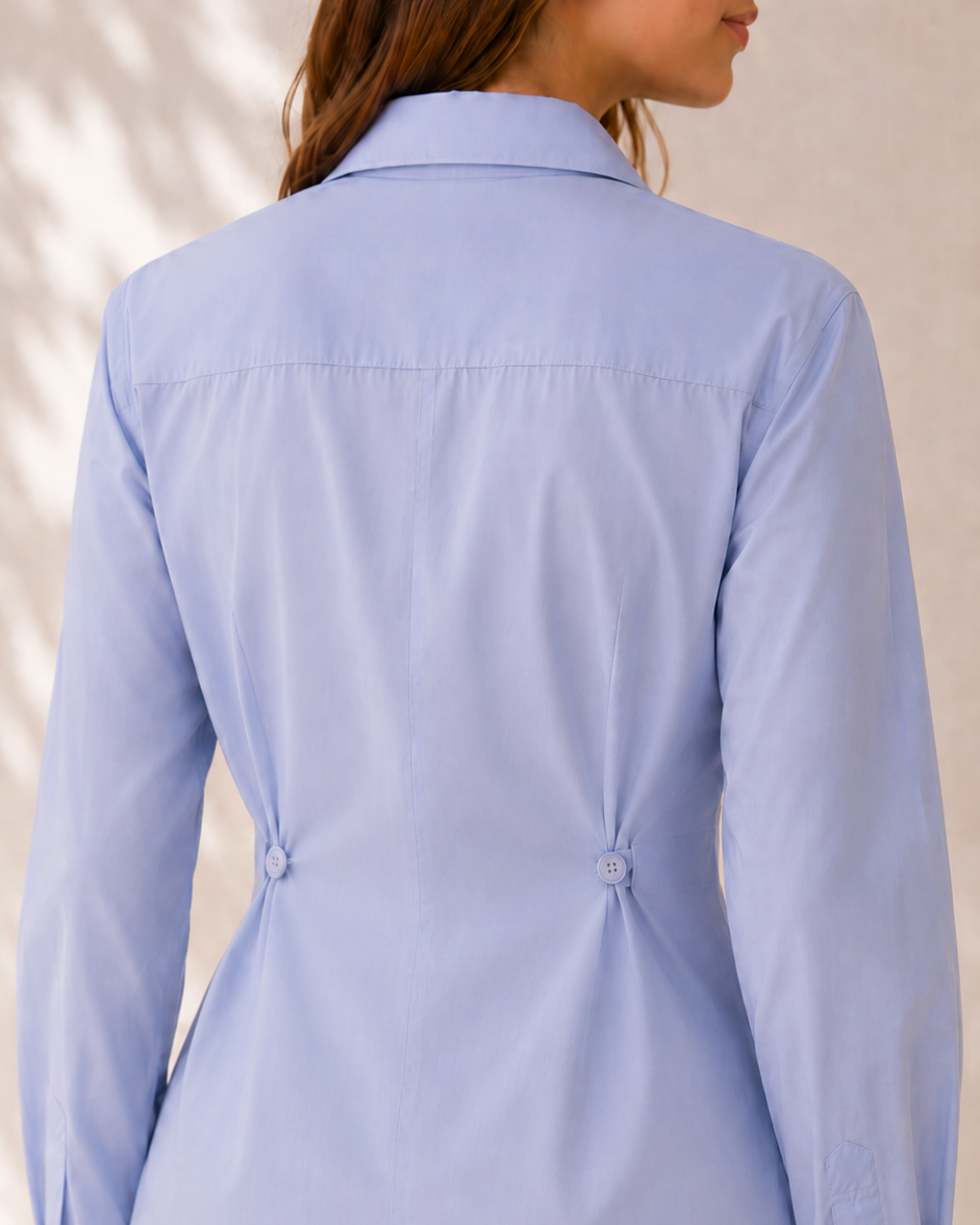 Powder blue sculpted shirt, back view showing buttoned waist pleats | Beyond Formals