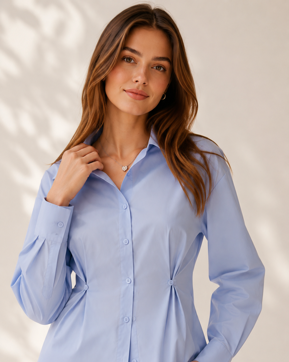 Powder blue shirt with structured collar and buttoned waist pleats, front view | Beyond Formals