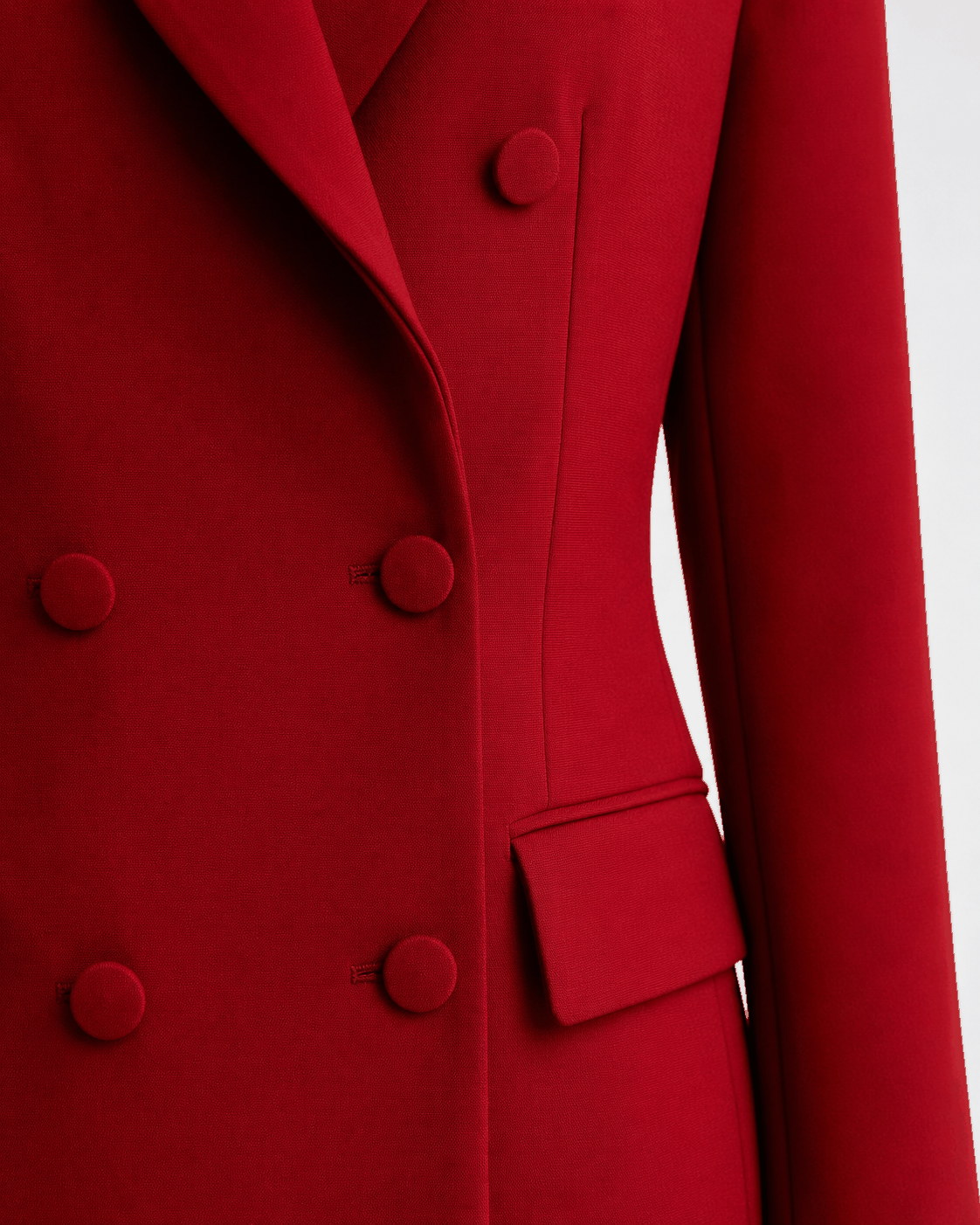 Red double-breasted blazer dress fabric-covered buttons and flap pocket, close-up | Beyond Formals