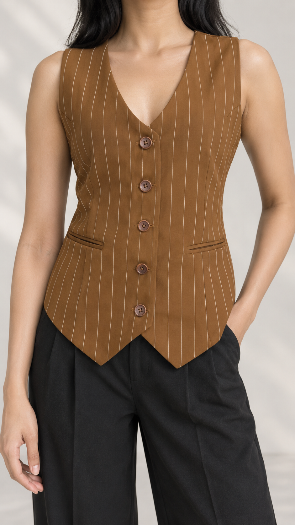 Brown pinstripe waistcoat close-up of V-neckline, five-button front and welt pockets | Beyond Formals