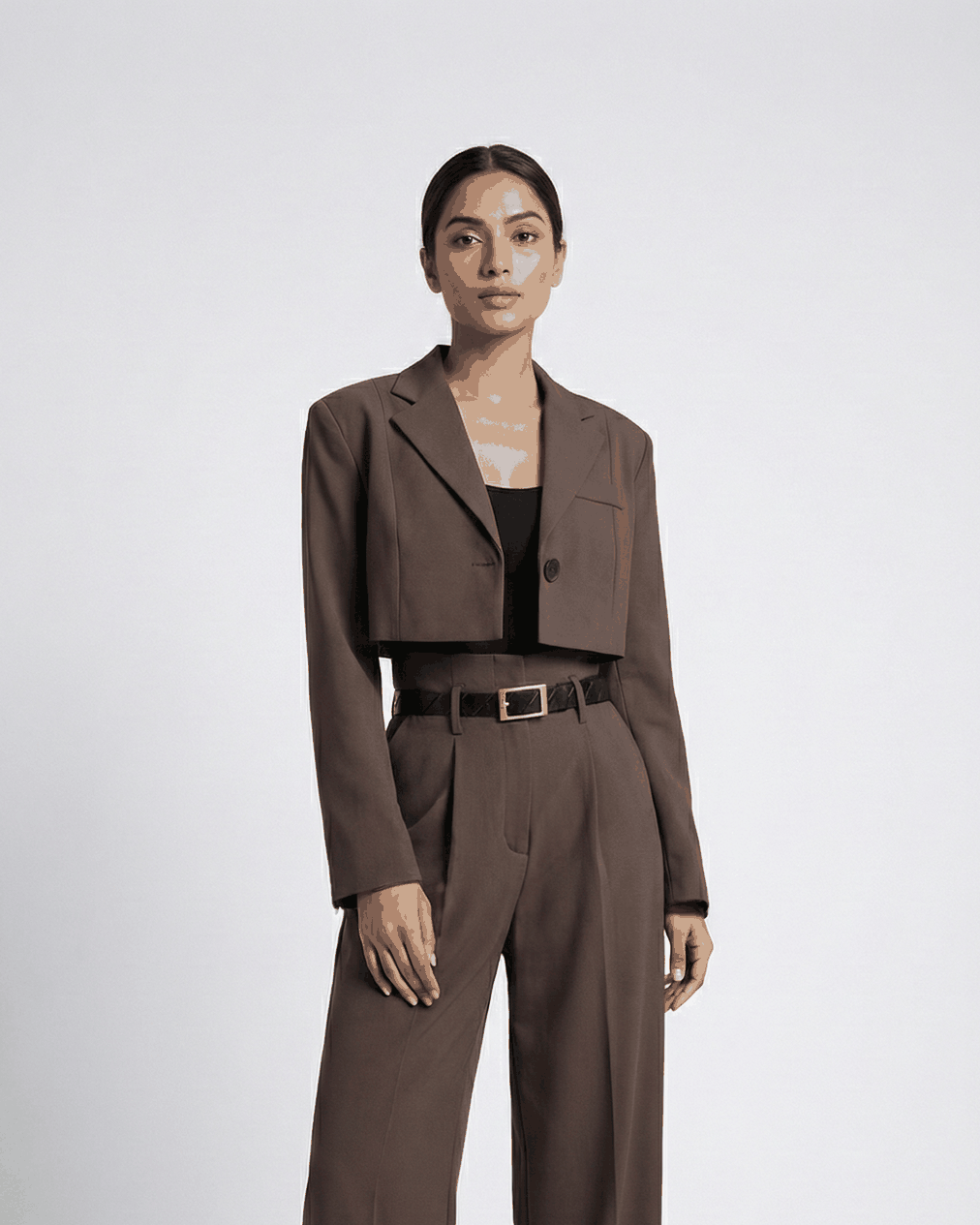 Brown cropped blazer and pleated wide-leg trouser suit set on model, full-length front view | Beyond Formals