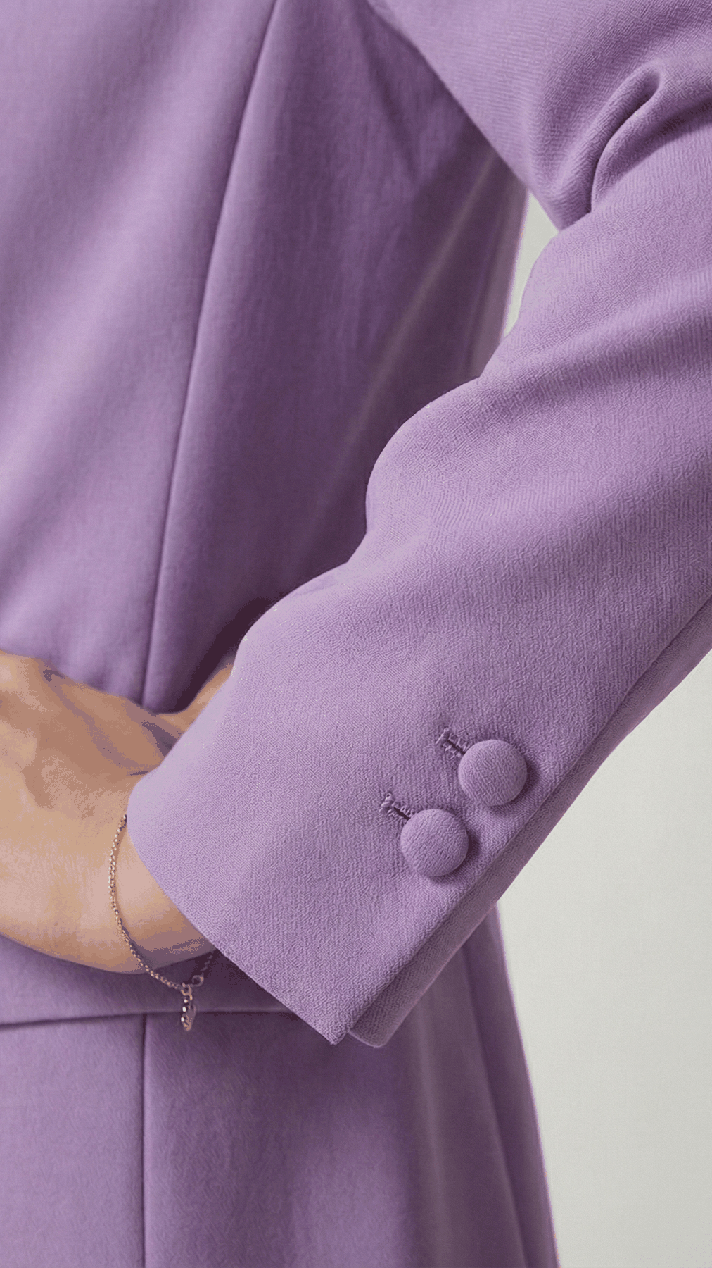 Lavender blazer sleeve, close-up of self-covered cuff buttons | Beyond Formals