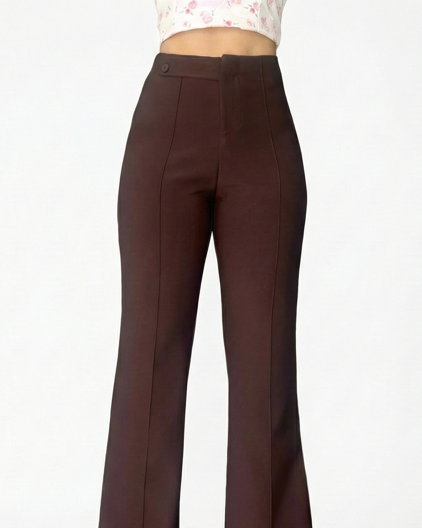 Brown flared pants on a white background