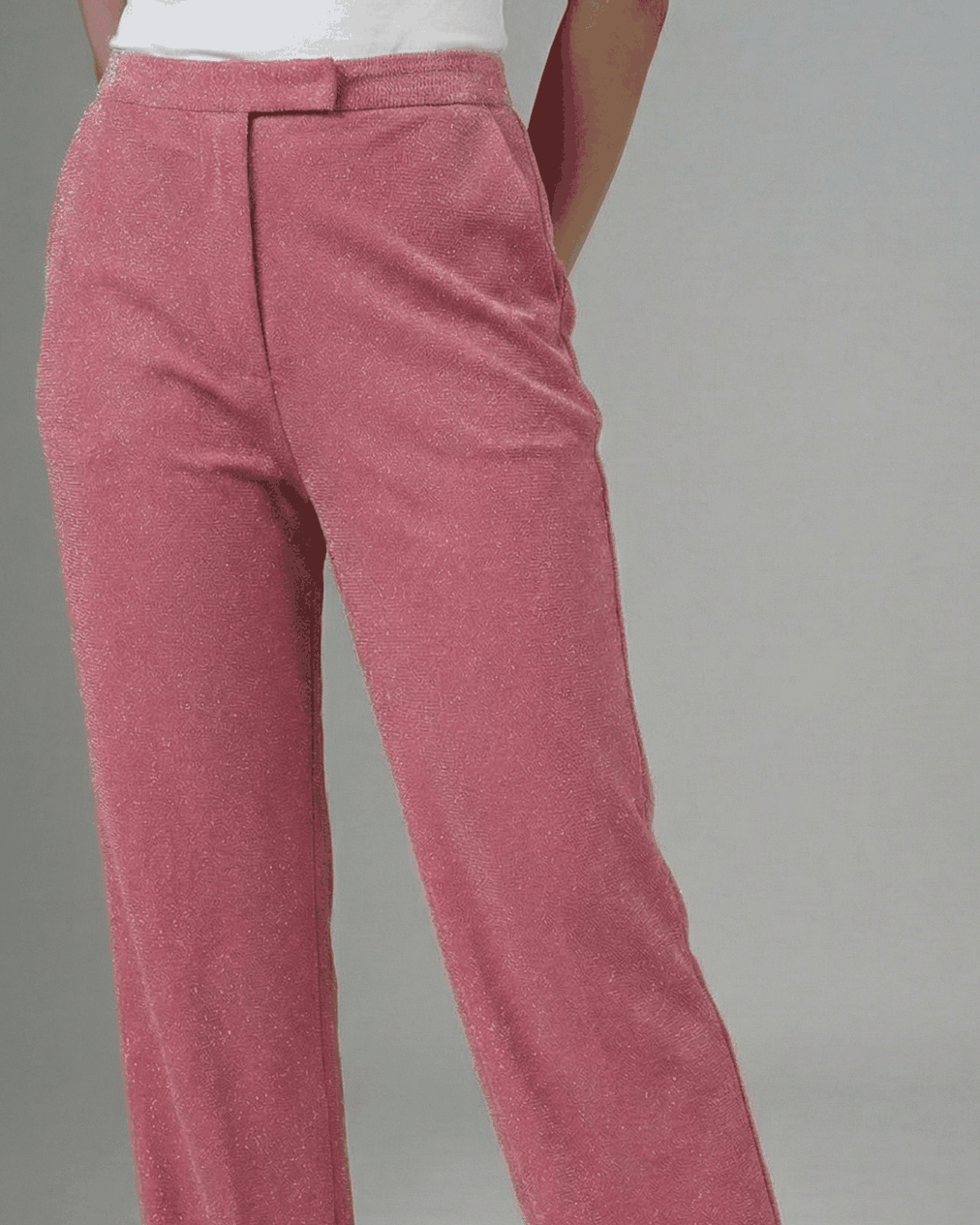 Pink shimmer straight-leg trousers, close-up of tab waistband and leg | Beyond Formals