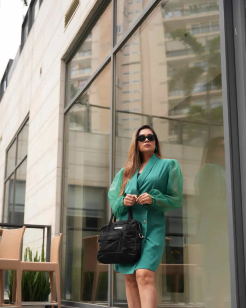 Women's green single-breasted blazer dress for minimalist styling.