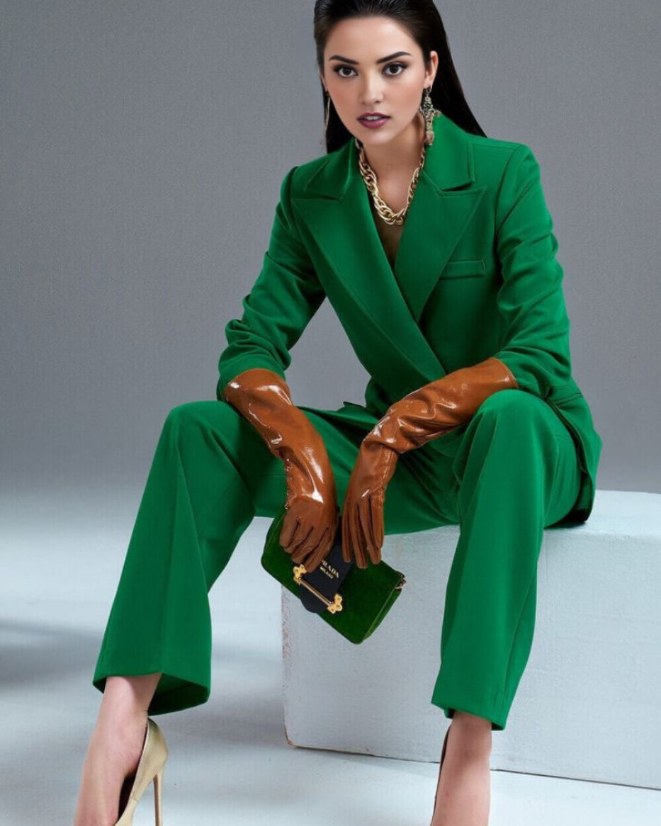 green plaid blazer suit set with padded shoulders and pleated pants.