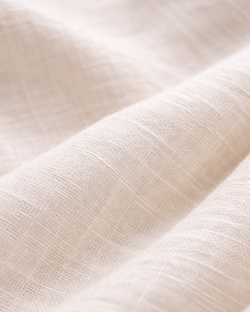 Close-up of beige fabric with a soft texture