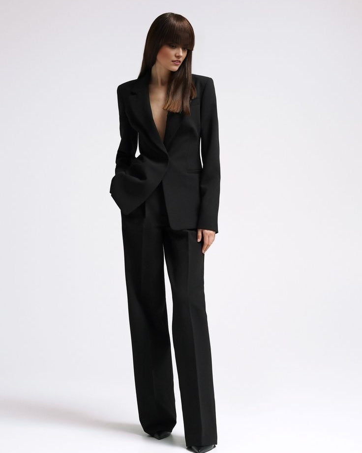 Women's black tailored blazer suit set with straight-fit trousers for office wear.