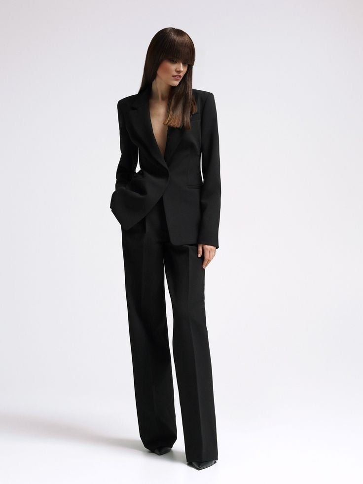 Women's black tailored blazer suit set with straight-fit trousers for office wear.