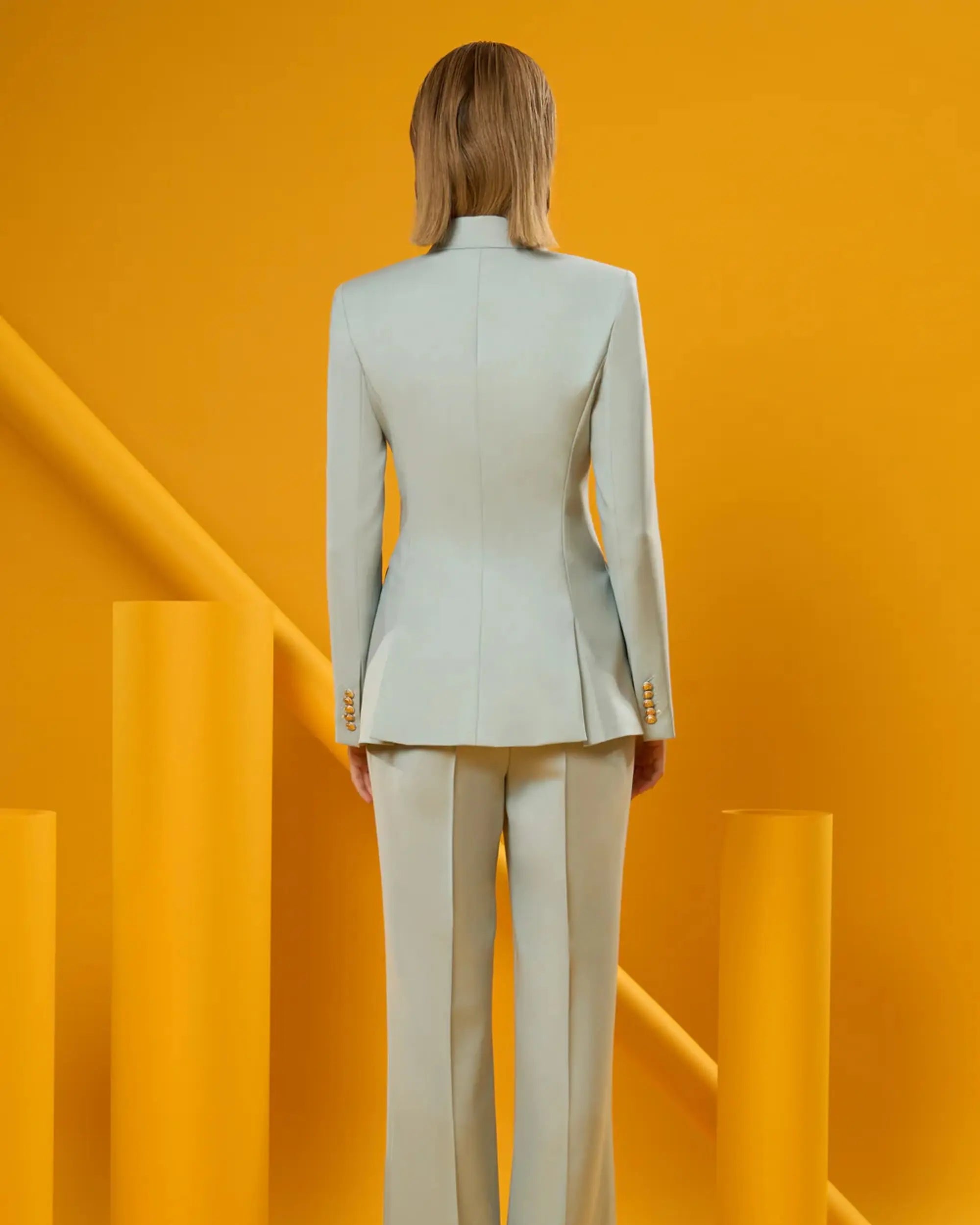 Women's mint blazer suit set with a modern tailored fit.