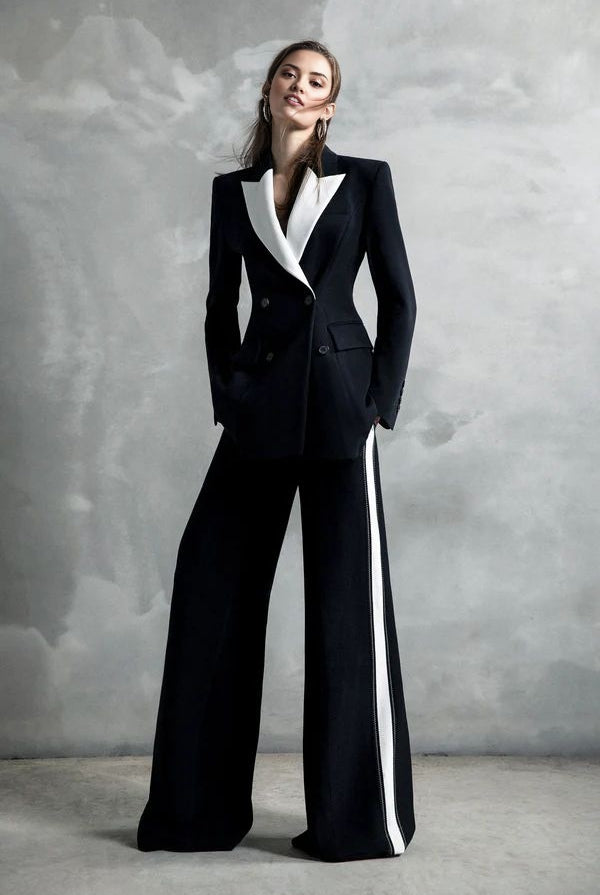 Women's black tailored blazer suit set with wide leg trousers for office wear.