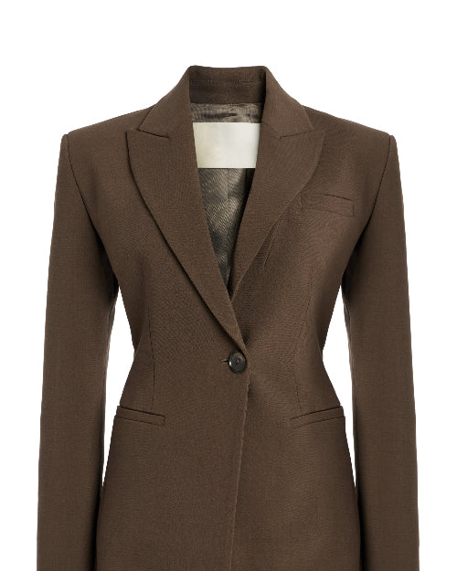 Women's brown fitted blazer with a notched lapel and single closure.
