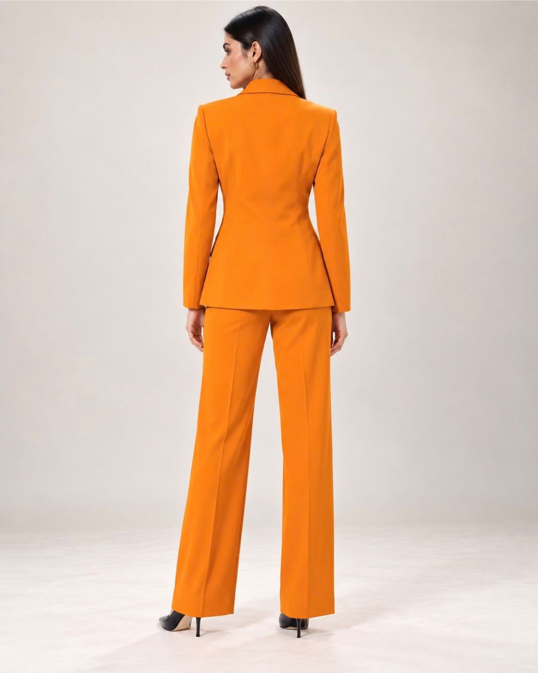 Mustard-orange single-breasted pant suit set – back view | Beyond Formals