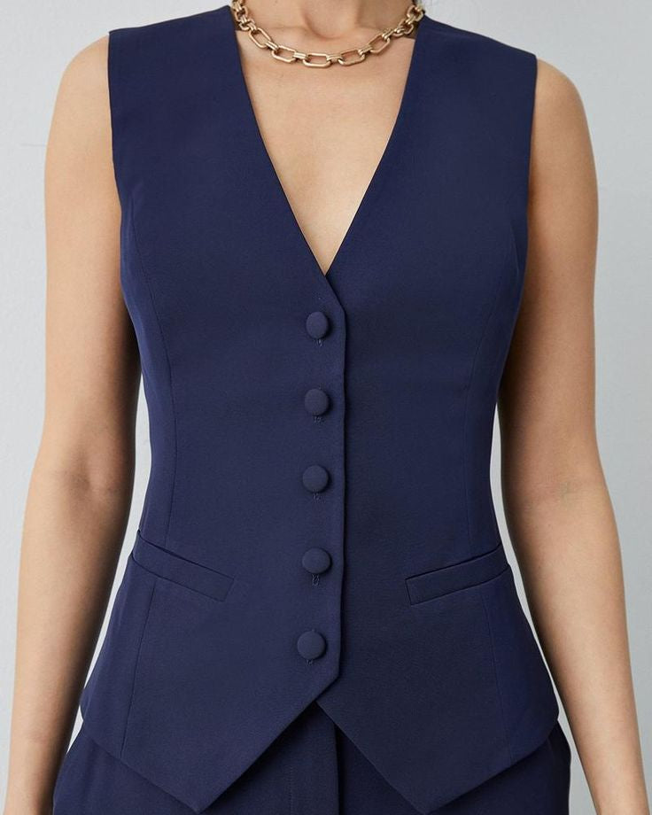 Women's navy blue cotton waistcoat with front pockets, perfect for summer formals.