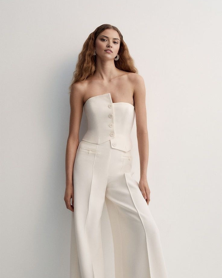 white bustier with panels for a bold formal statement.