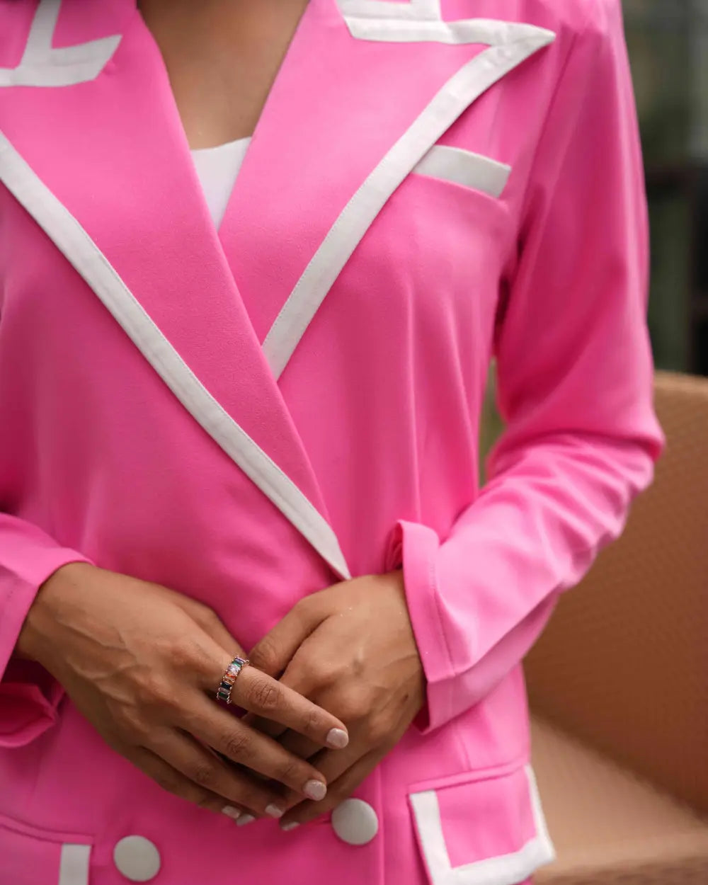 Women's pink blazer dress with a high neckline for evening formals.