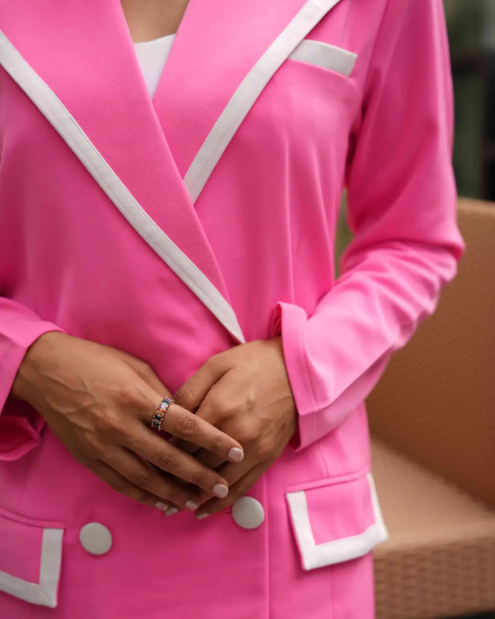 Women's pink blazer dress with a high neckline for evening formals.