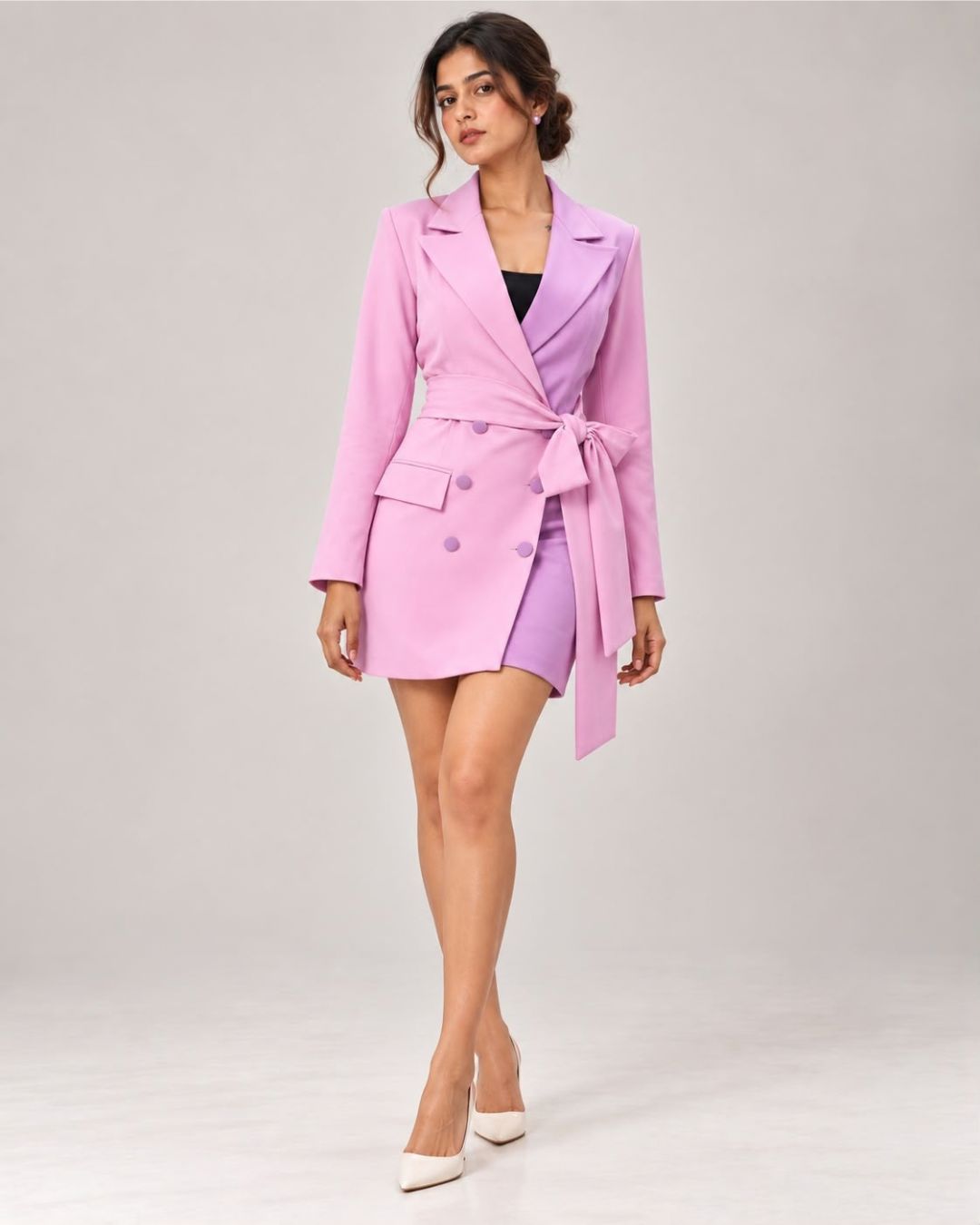 Pink and lavender two-tone double-breasted blazer dress with waist tie – front view on model | Beyond Formals