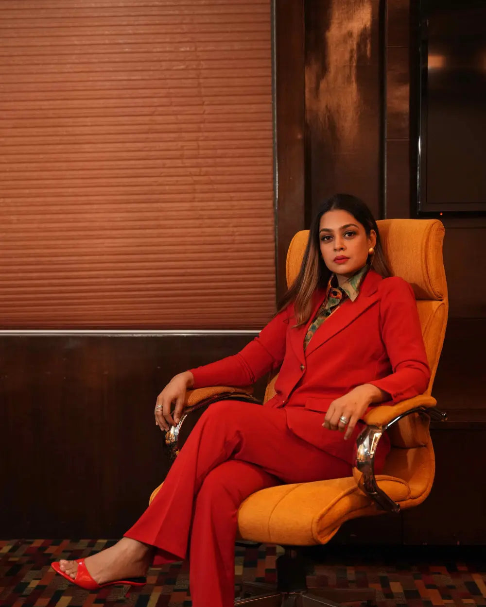 Bold red blazer suit set for corporate events.