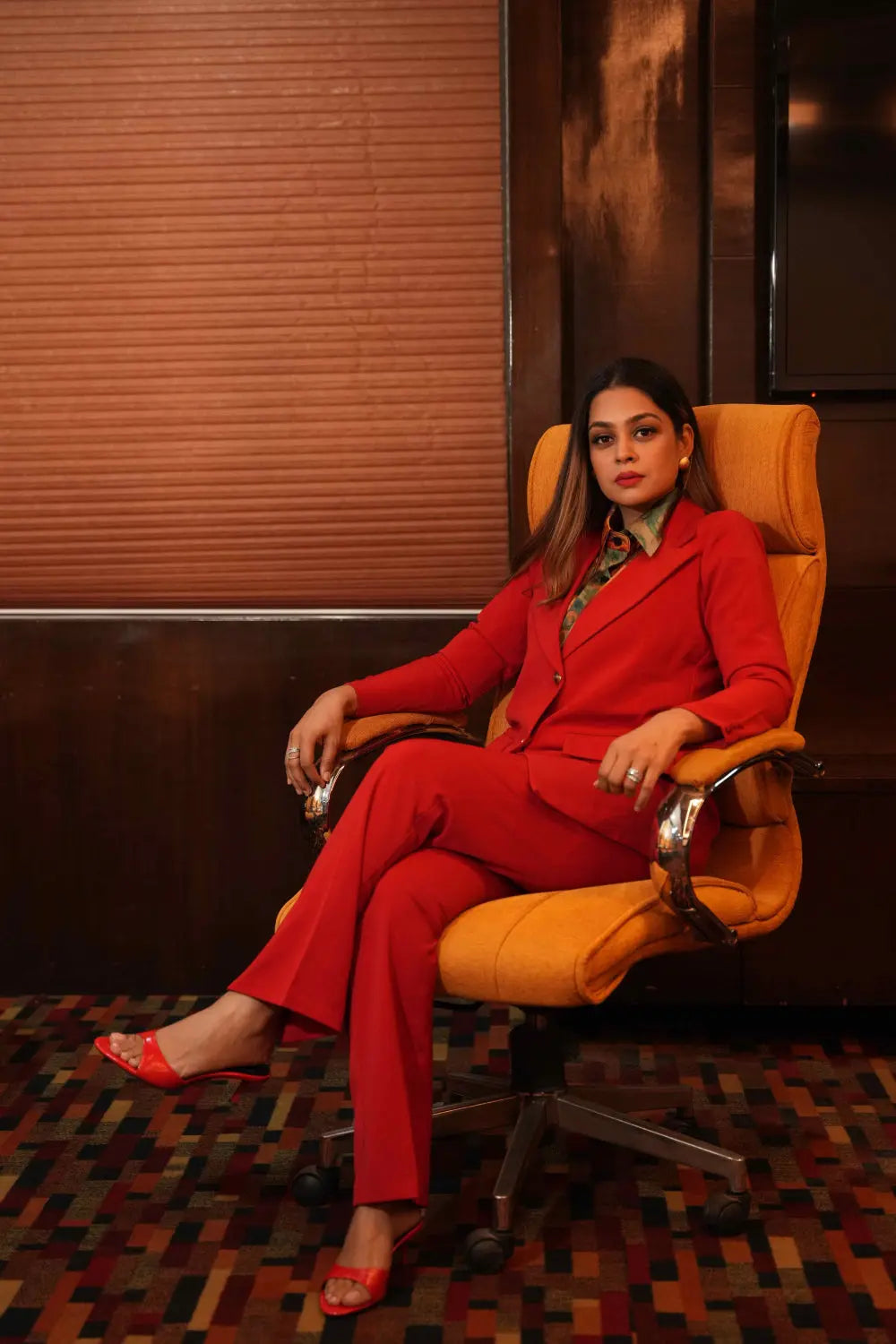 Bold red blazer suit set for corporate events.