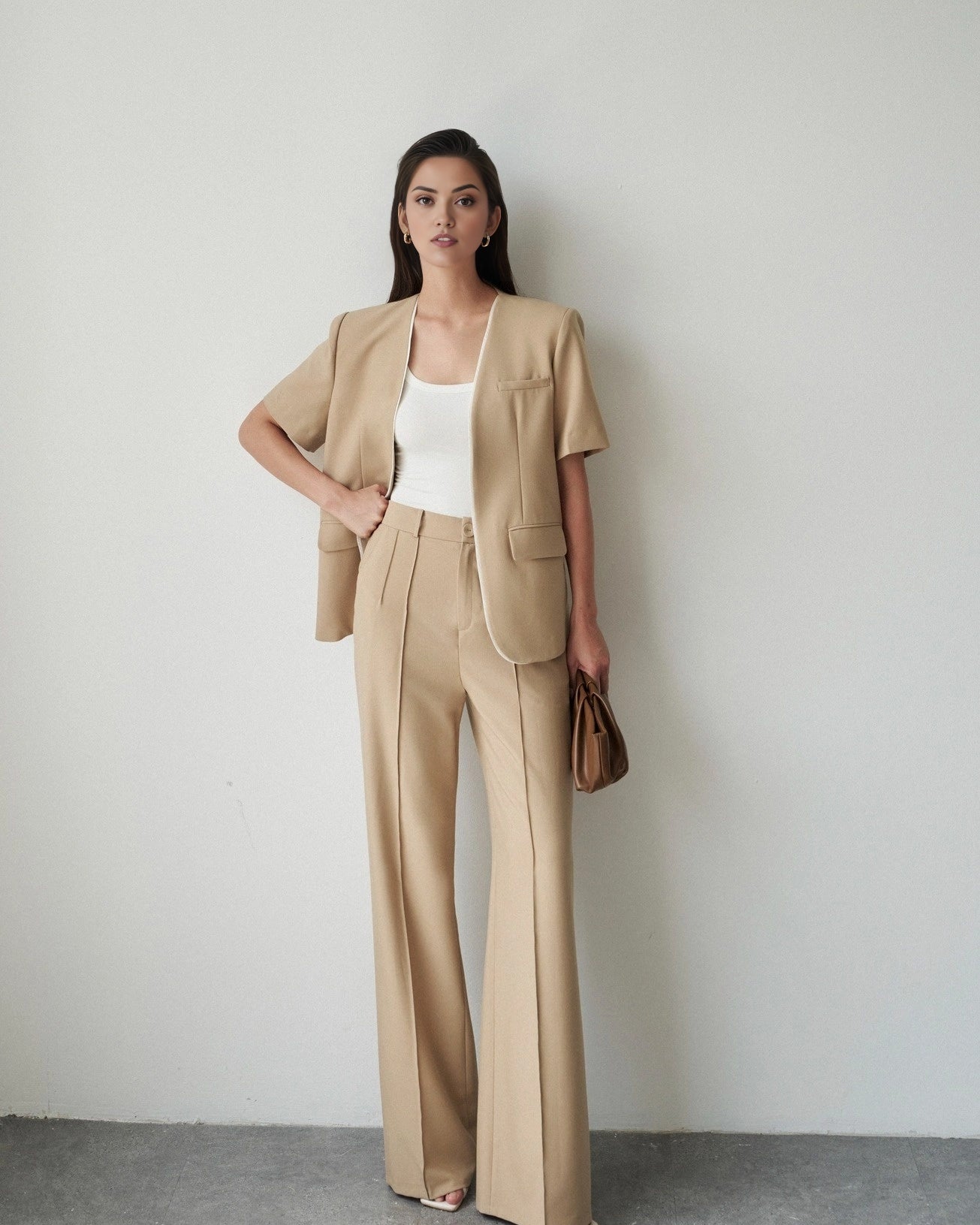 Women's cotton short sleeve co-ord set featuring a longline blazer and tailored pants.
