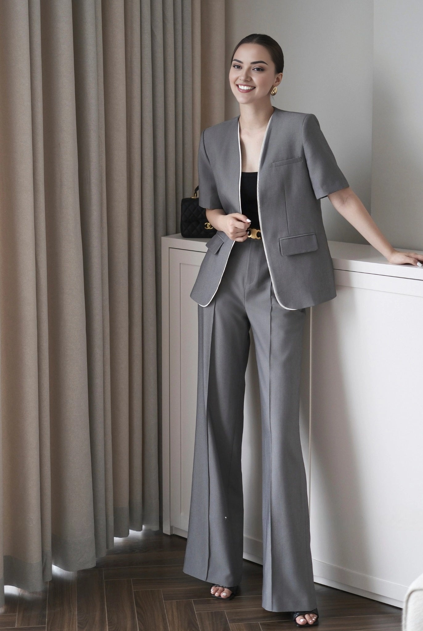 Women's cotton short sleeve co-ord set featuring a longline blazer and tailored pants.