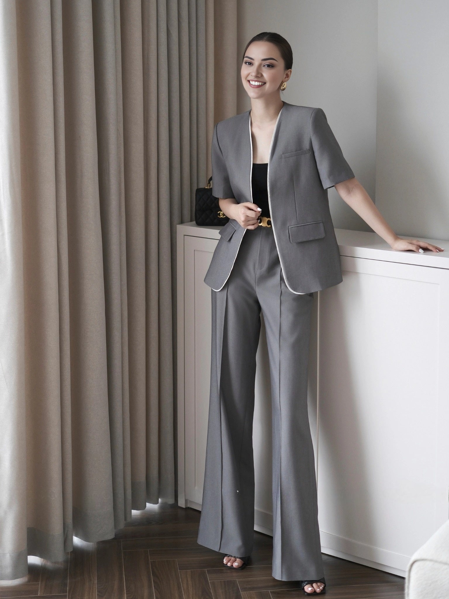 Women's cotton short sleeve co-ord set featuring a longline blazer and tailored pants.