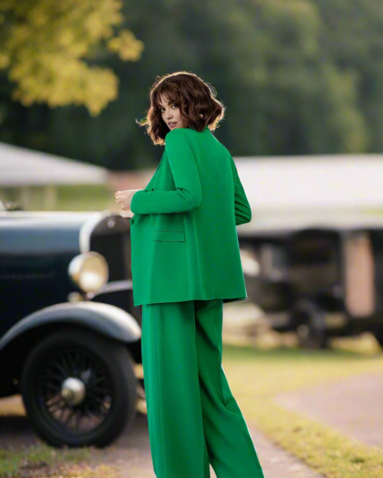Green cotton blazer with front pockets for summer formals.