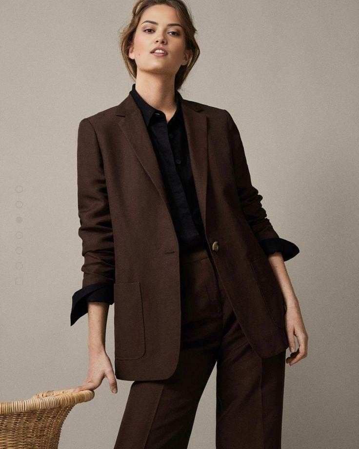 Women's mocha muse fitted blazer with a notched lapel, pocket detailing and single closure.