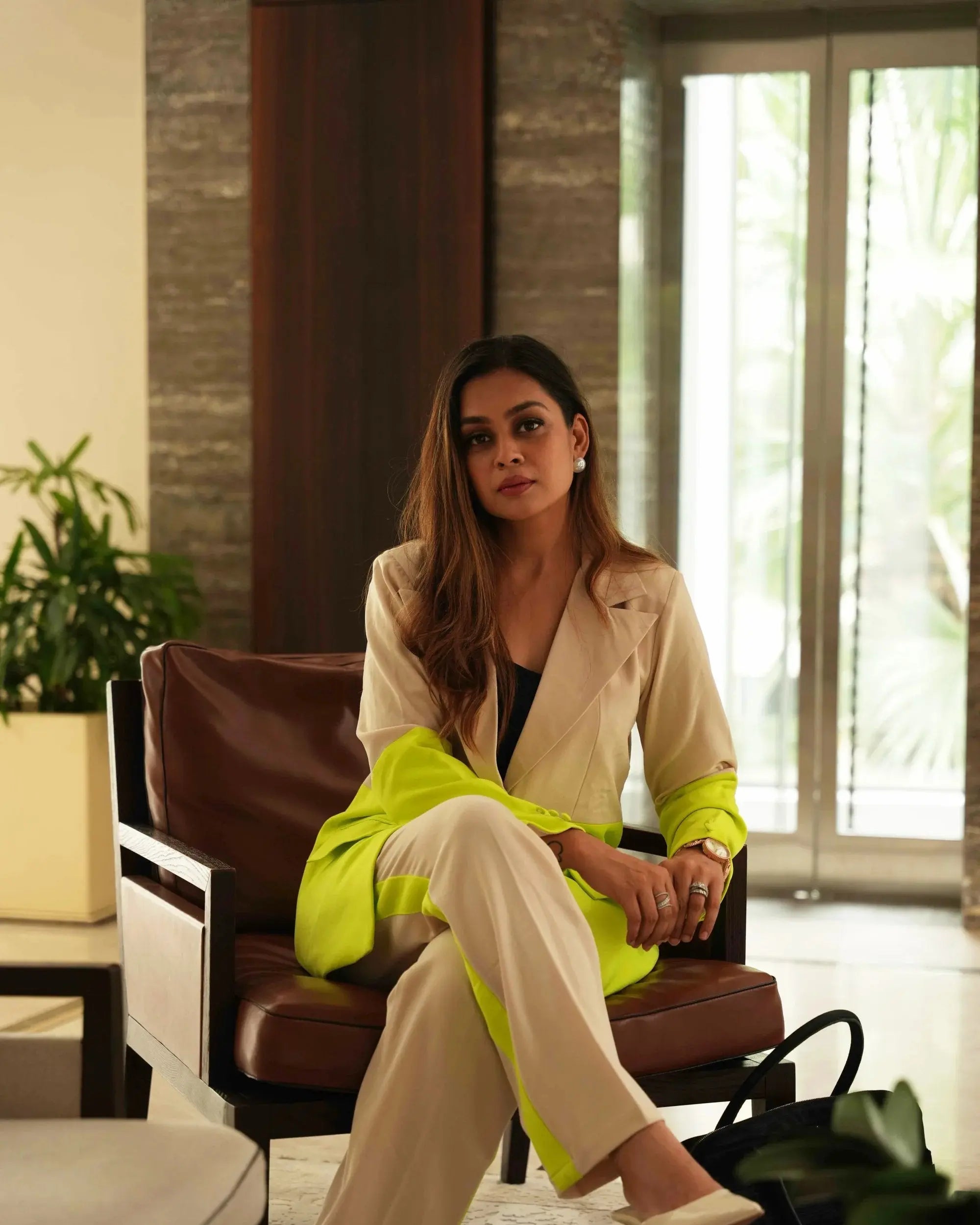 dual toned plaid blazer suit set with padded shoulders and straight fit pants.