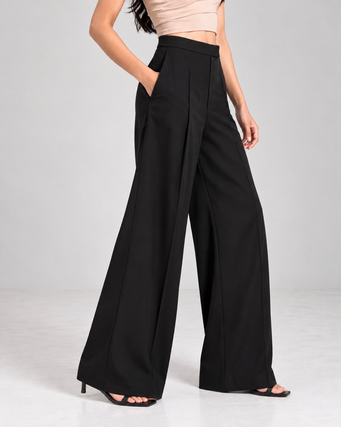 Black high-rise wide-leg trousers, side view showing wide fall and side pocket | Beyond Formals