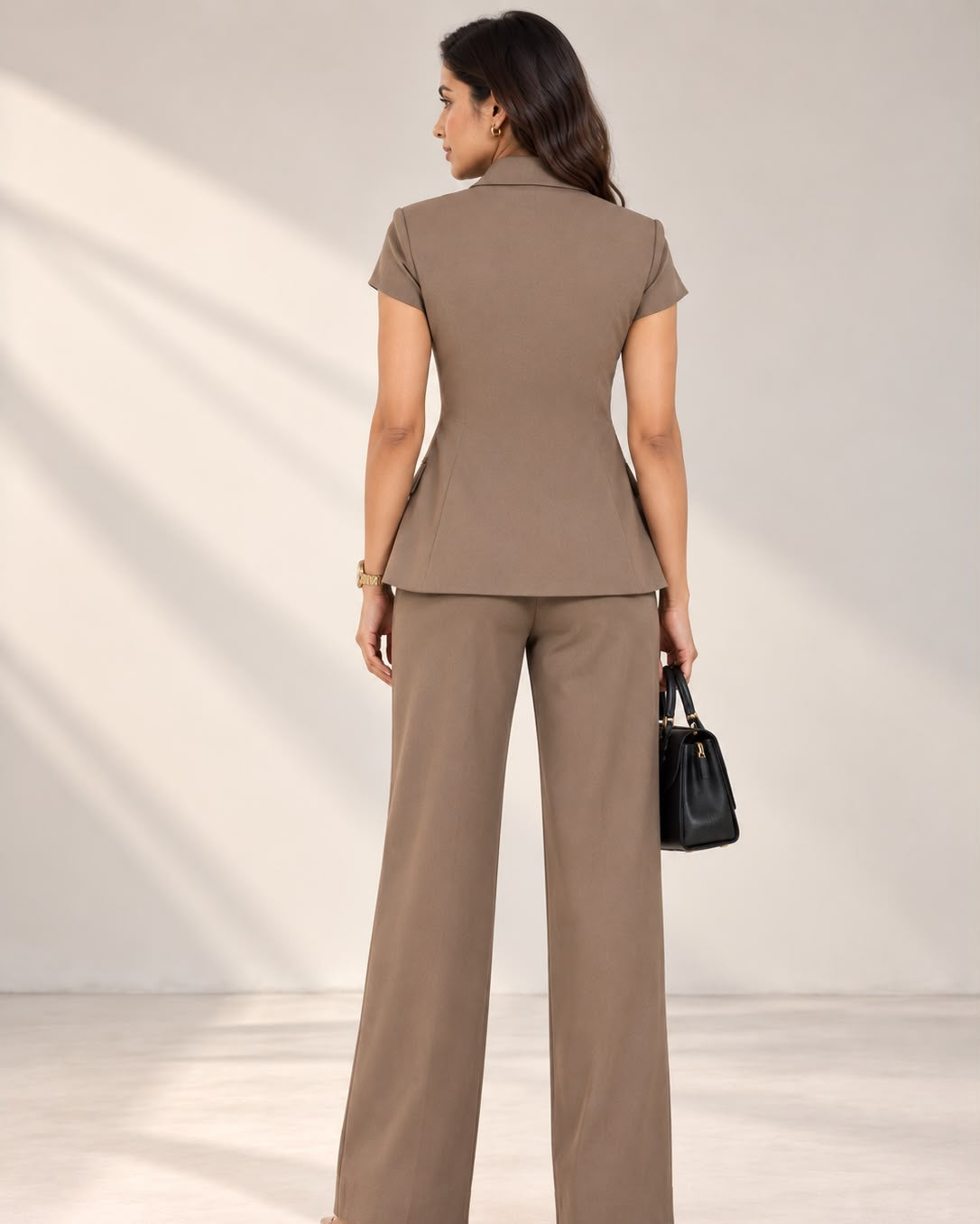 Beige short-sleeve pant suit set – back view | Beyond Formals