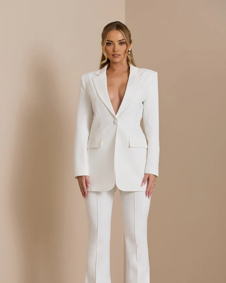 White double-breasted blazer suit set for formal business meetings.