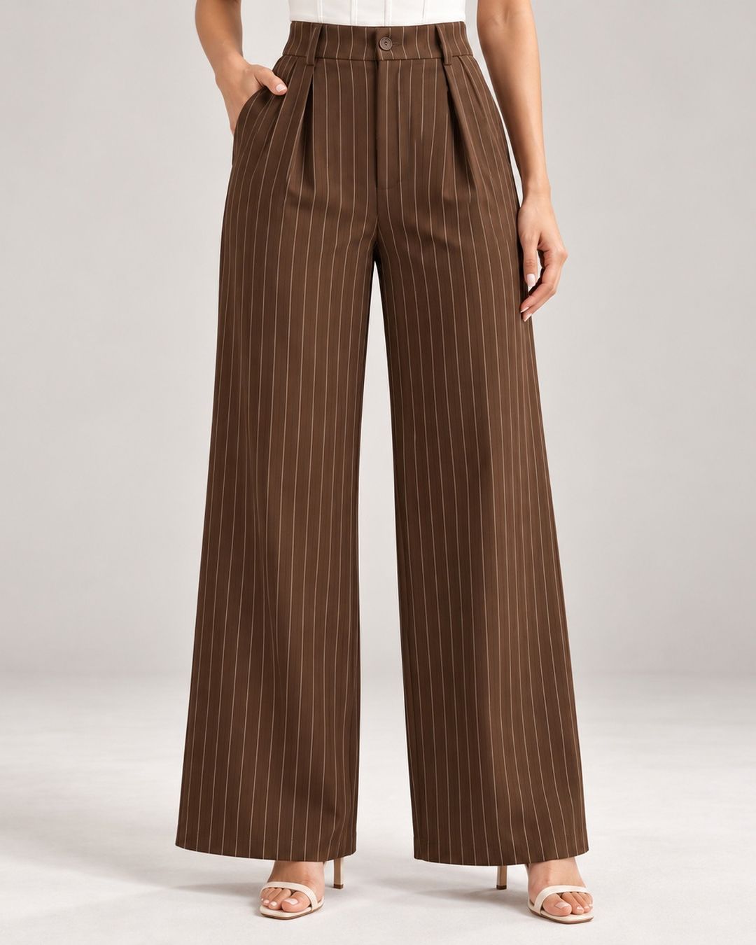 Brown pinstripe trousers close-up of button waistband, front pleats and pockets | Beyond Formals
