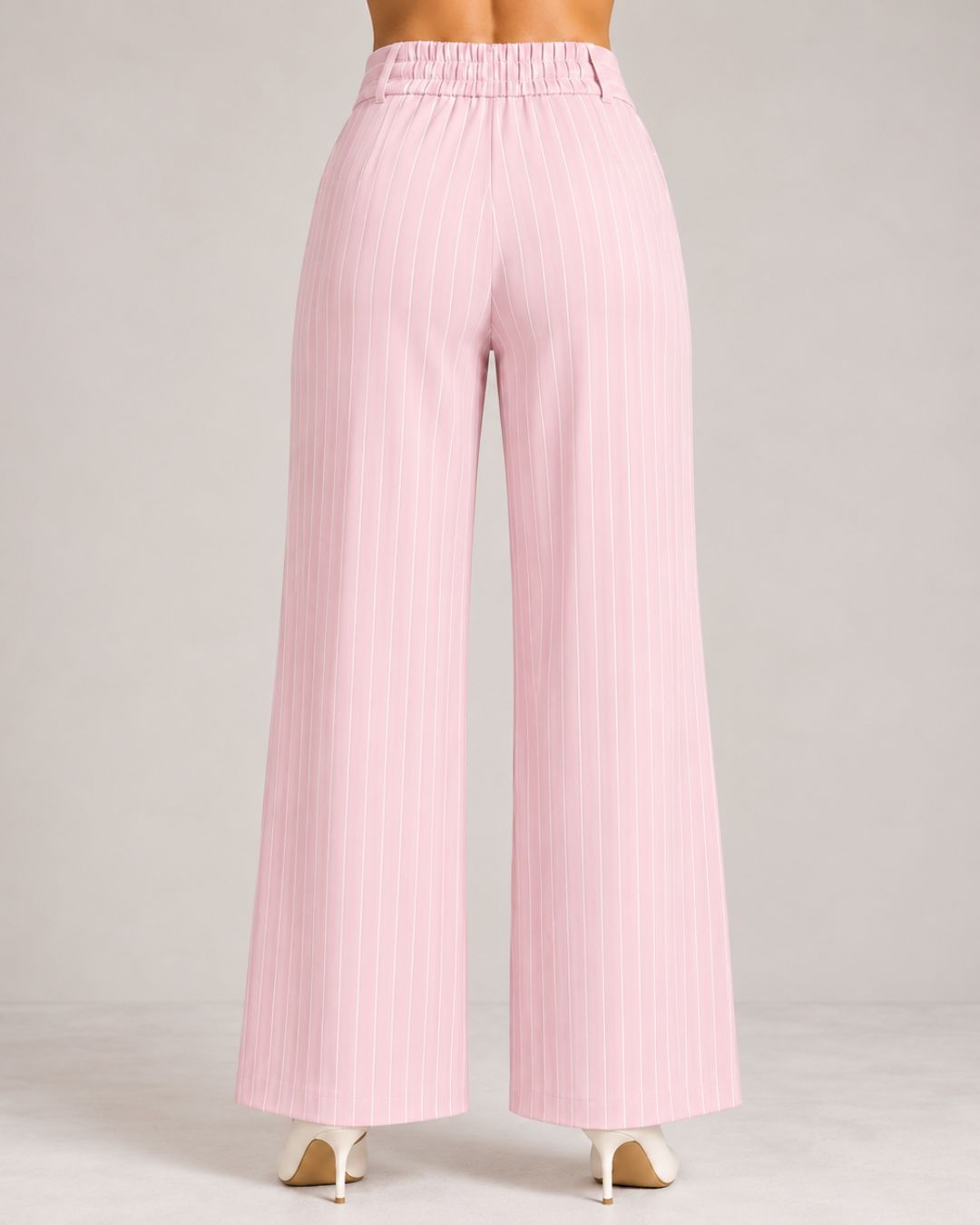 Back view of light pink pinstripe wide-leg trousers showing elasticated waistband | Beyond Formals