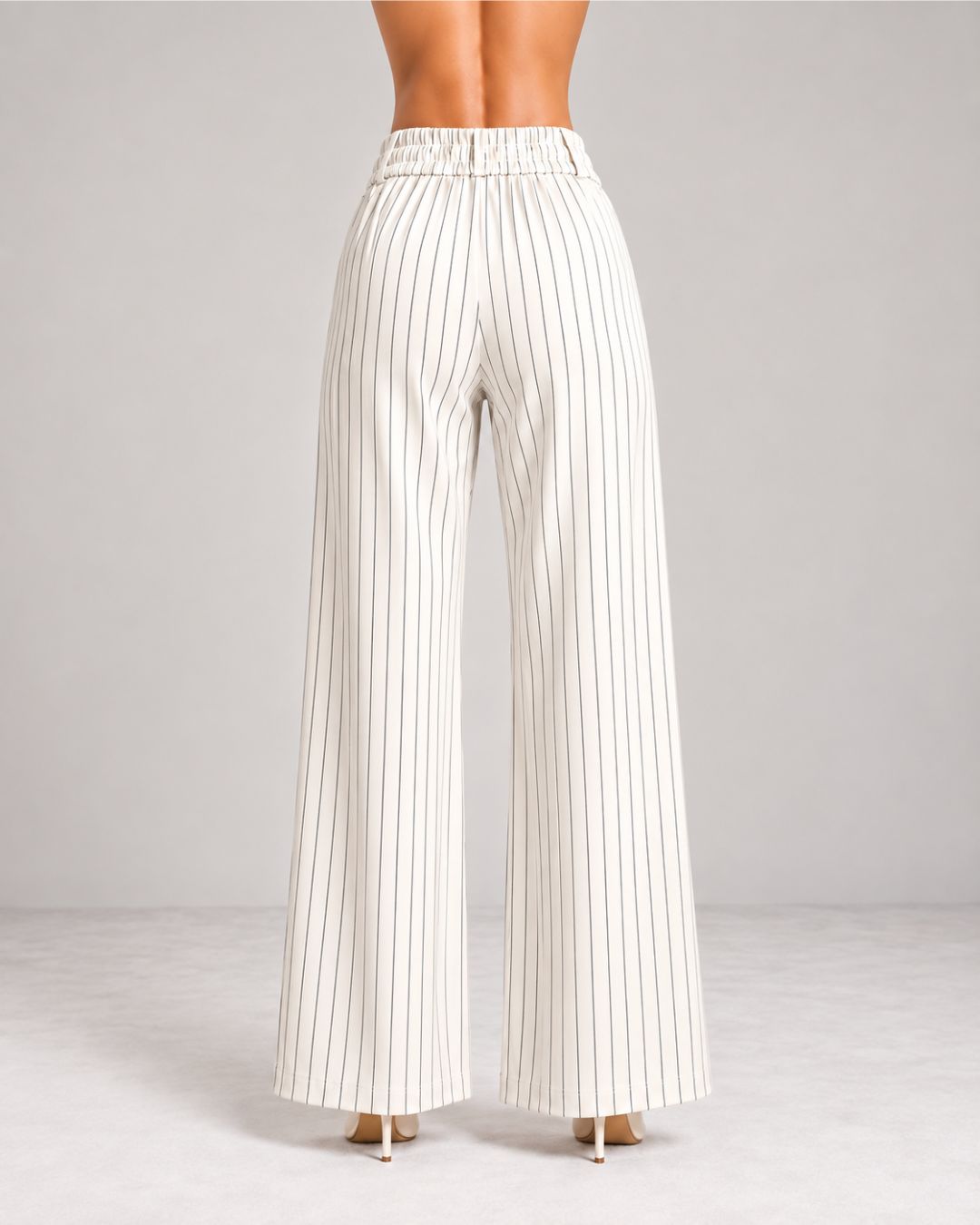 Back view of white pinstripe wide-leg trousers showing elasticated waistband | Beyond Formals