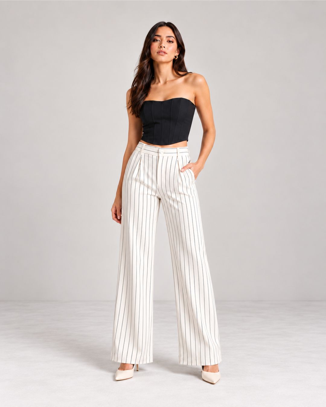 White pinstripe high-waist wide-leg trousers with black corset top, full-length front view | Beyond Formals