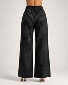 Back view of black pinstripe wide-leg trousers showing elasticated waistband | Beyond Formals