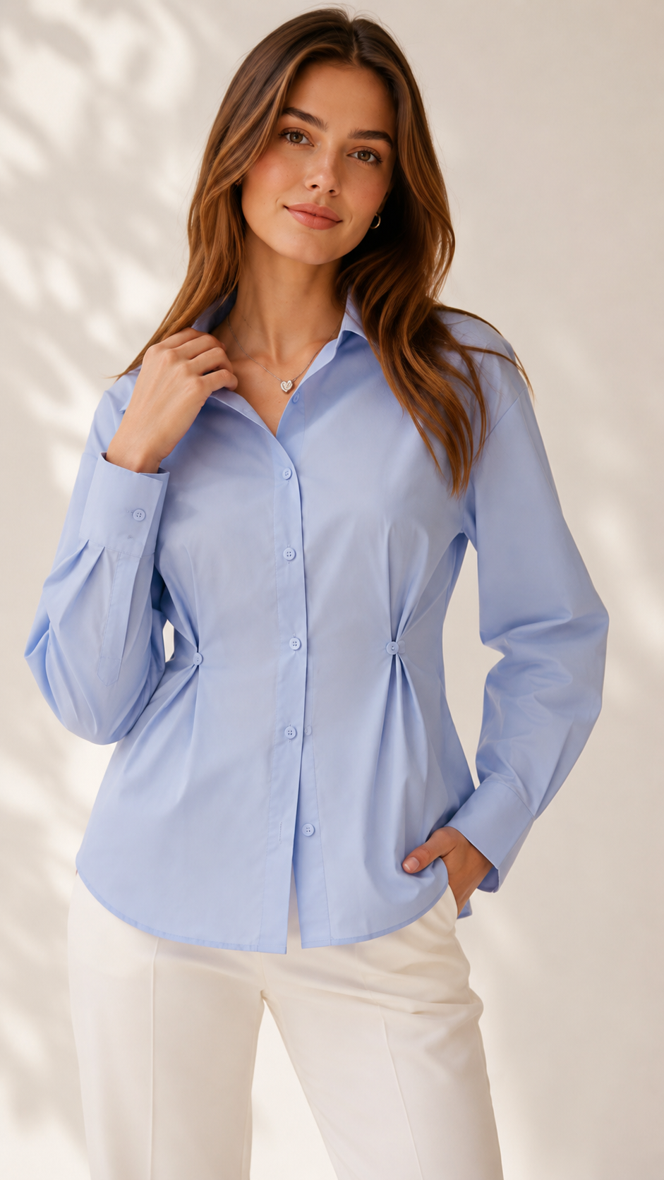 Powder blue shirt with structured collar and buttoned waist pleats, front view | Beyond Formals