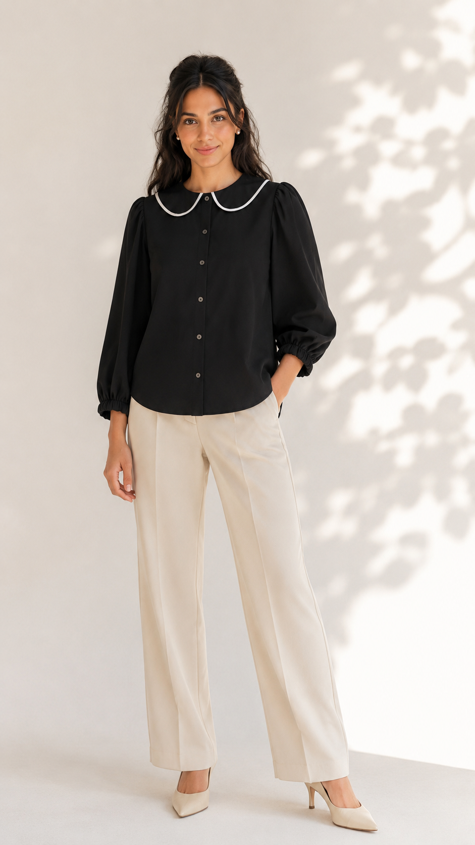 Black contrast collar shirt with white-piped rounded collar, worn with cream trousers, full front view | Beyond Formals