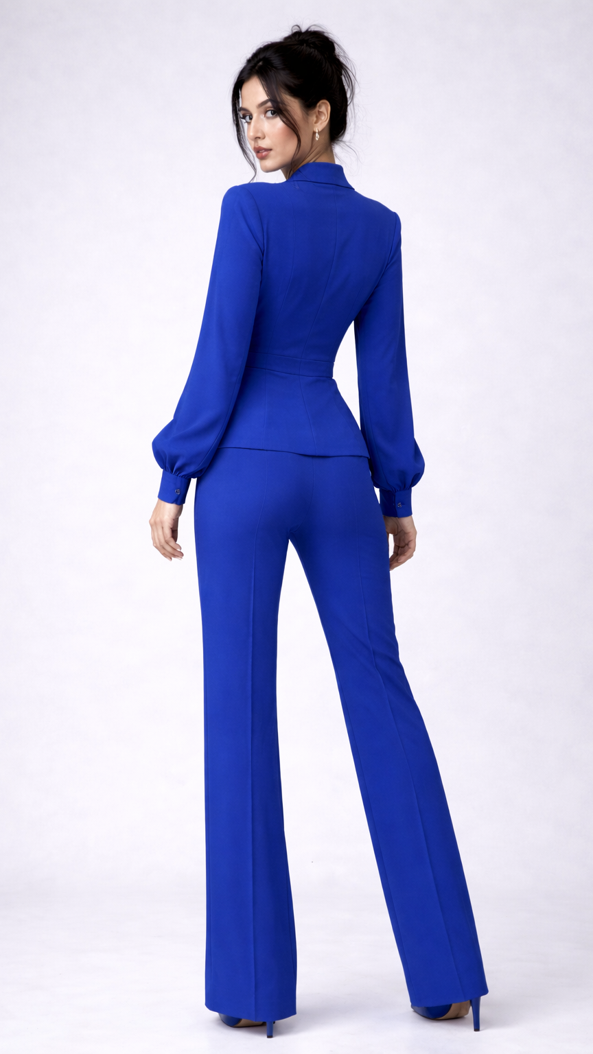 Woman wearing a blue outfit on a white background