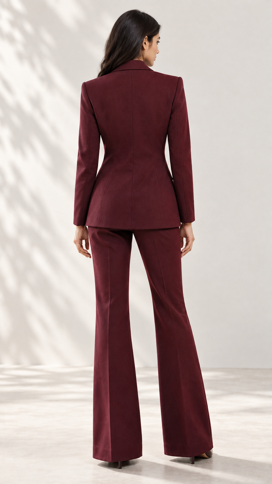 Maroon blazer back view showing waist tailoring, with flared trousers | Beyond Formals