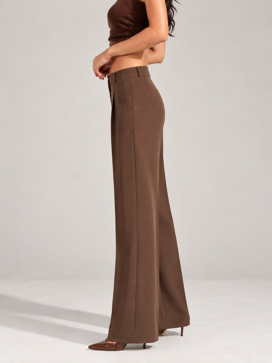 Brown high-rise wide-leg trousers, side view showing straight fall and side pocket | Beyond Formals
