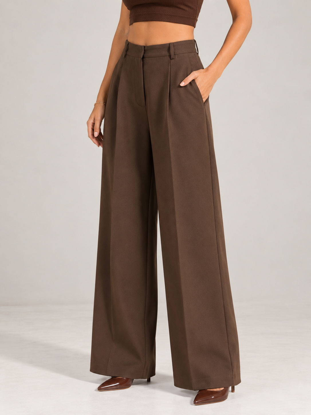 Brown wide-leg trousers with front crease, front view from waist to hem | Beyond Formals