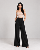 Black high-rise wide-leg trousers on model with nude crop top, full front view | Beyond Formals