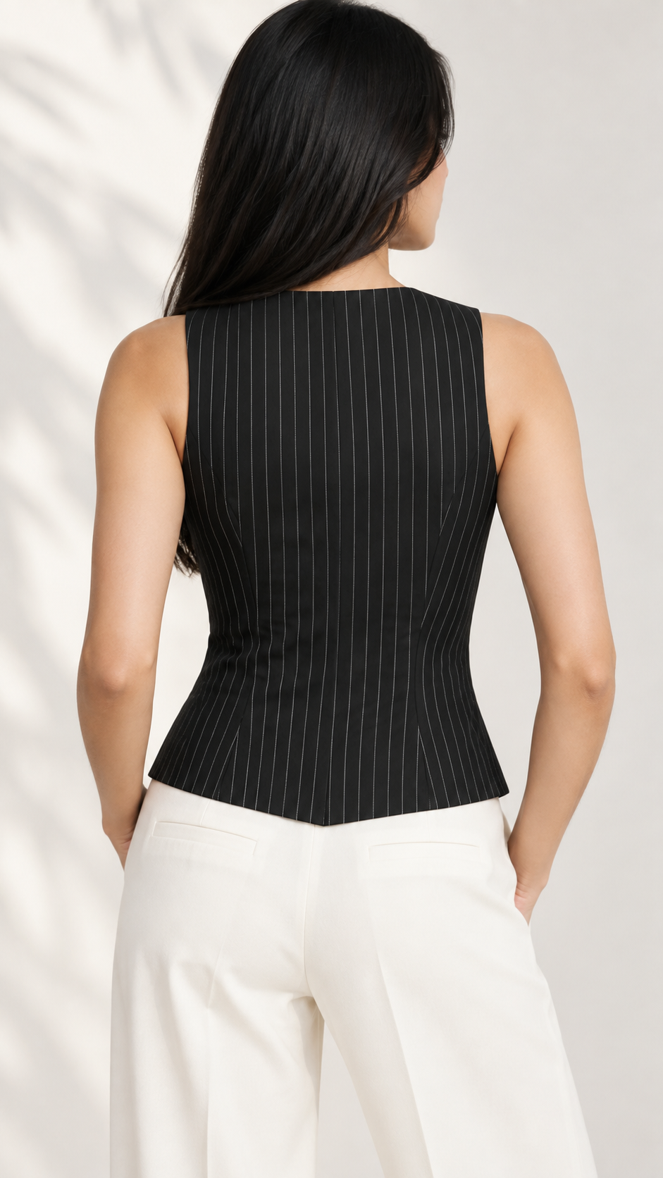 Black pinstripe waistcoat back view with white trousers | Beyond Formals